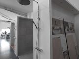 an image of a bathroom with a walk in shower
