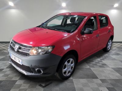 a picture of a red car parked in a garage
