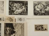 several black and white pictures of people and animals on a wall