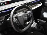 a car dashboard with a steering wheel and a dash board