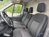 a view of the inside of a van from the driver ' s seat