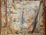 an image of a tapestry hanging on a wall in a room
