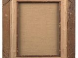 an old picture frame with a piece of paper taped around it