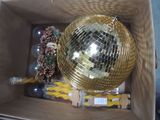 a box with a mirror ball inside of it