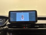 a picture of a car dashboard with a picture of a person on the screen