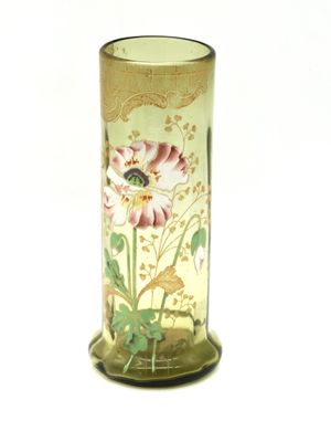a glass vase with a floral design on it
