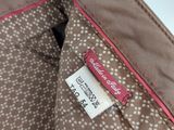 the inside of a purse with a label on it