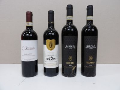 three bottles of red wine are lined up on a table
