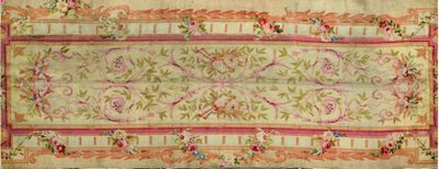 an antique rug with a floral design on a white background