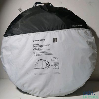 a black and white picture of a bag on a shelf