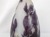 a vase with a purple and white design on it