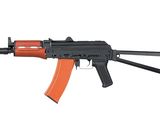a toy ak - 74 rifle with an orange and black body