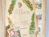 an old book with a bunch of stamps on it