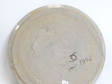 a close up of a white plate with writing on it