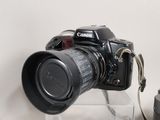a camera that is sitting on top of a clear box