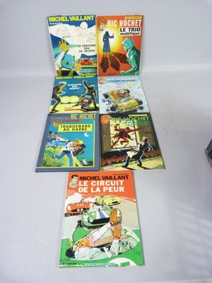 plusieurs livres pour enfants sont alignés sur une surface blanche