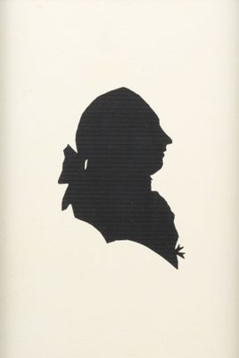 silhouette of a man in a hat with a bow on his head