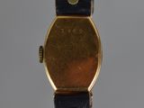 an image of a close up of a wrist watch with a leather band