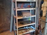 a shelf that has a lot of tools on it