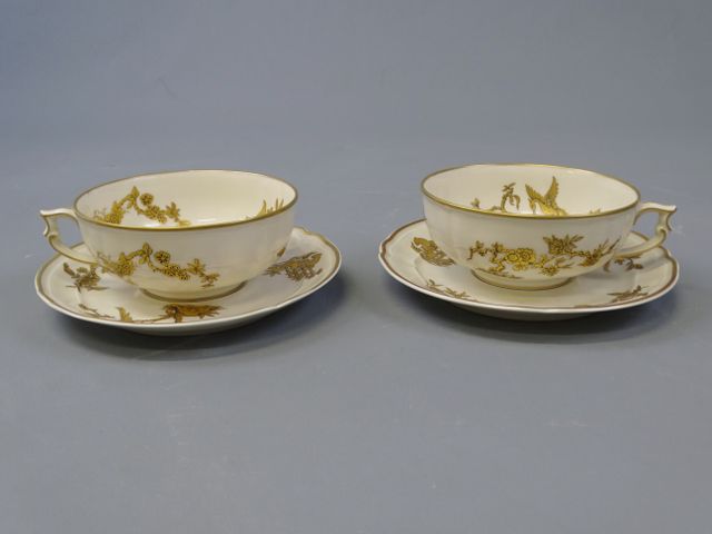 Bernardaud et Cie : deux déjeuner en porcelaine crème à décor dor...