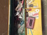 a box with tools in it sitting on the floor