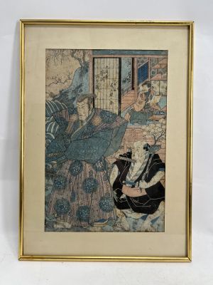 an image of a framed picture of a woman sitting on a couch