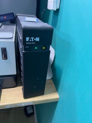 a printer and a printer on a shelf next to each other