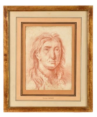 un dessin représentant le visage d'une femme dans un cadre doré