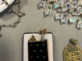 a lot of jewelry that is on a table