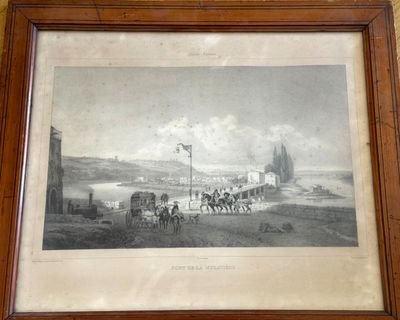 framed picture of a view of a town with a horse drawn carriage