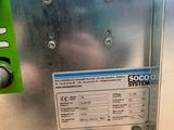 une image représentant une machine sur laquelle est apposée une pancarte