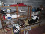 a desk with a lot of clutter on it