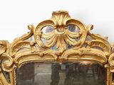a mirror that is sitting on the wall