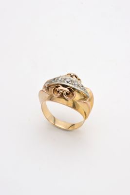 a close up of a gold ring with diamonds on a white background