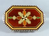 an image of a decorative tray with a flower design on it