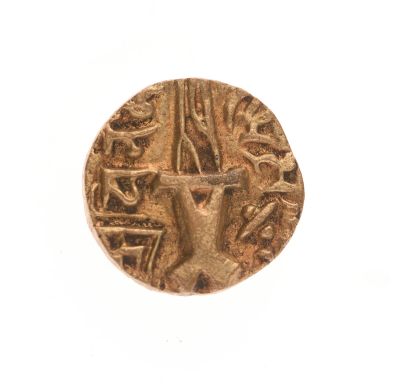 l'image d'une pièce d'or ornée d'un oiseau