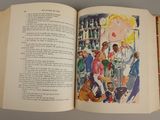 an open book with a picture of a woman on it
