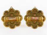 pair of gold plated cufflinks with red and white stones