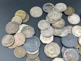 a lot of coins that are on a table