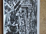 black and white photograph of an aerial view of a city from the air
