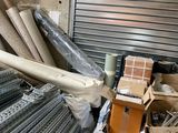 a pile of assorted items in a warehouse