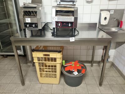 two toasters on the table in the kitchen