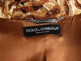 a close up of a label on a brown dress