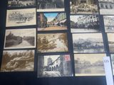 a lot of old black and white pictures on the wall