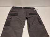 men ' s grey cargo pants with pockets and a belt