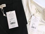 two pairs of black and white shirts and a white shirt with a tag