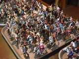 a lot of figurines that are sitting on a table