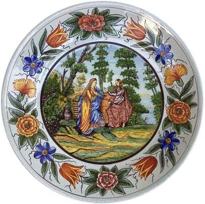 a plate with a picture of a woman and a man riding a horse