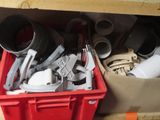 a red container filled with different types of tools
