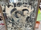 framed painting of a black and white painting with a pink chair in the background